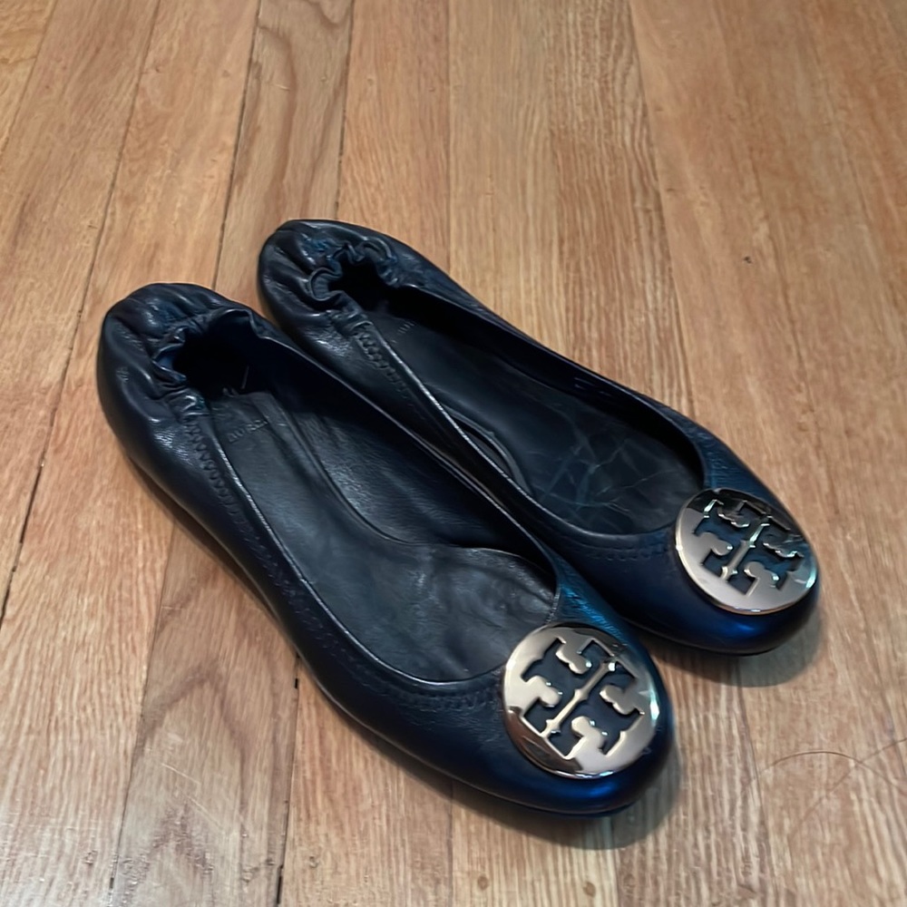 Tory Burch black leather flats with gold hardware